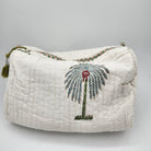 Palm block-print wash bag, blue palms on cream