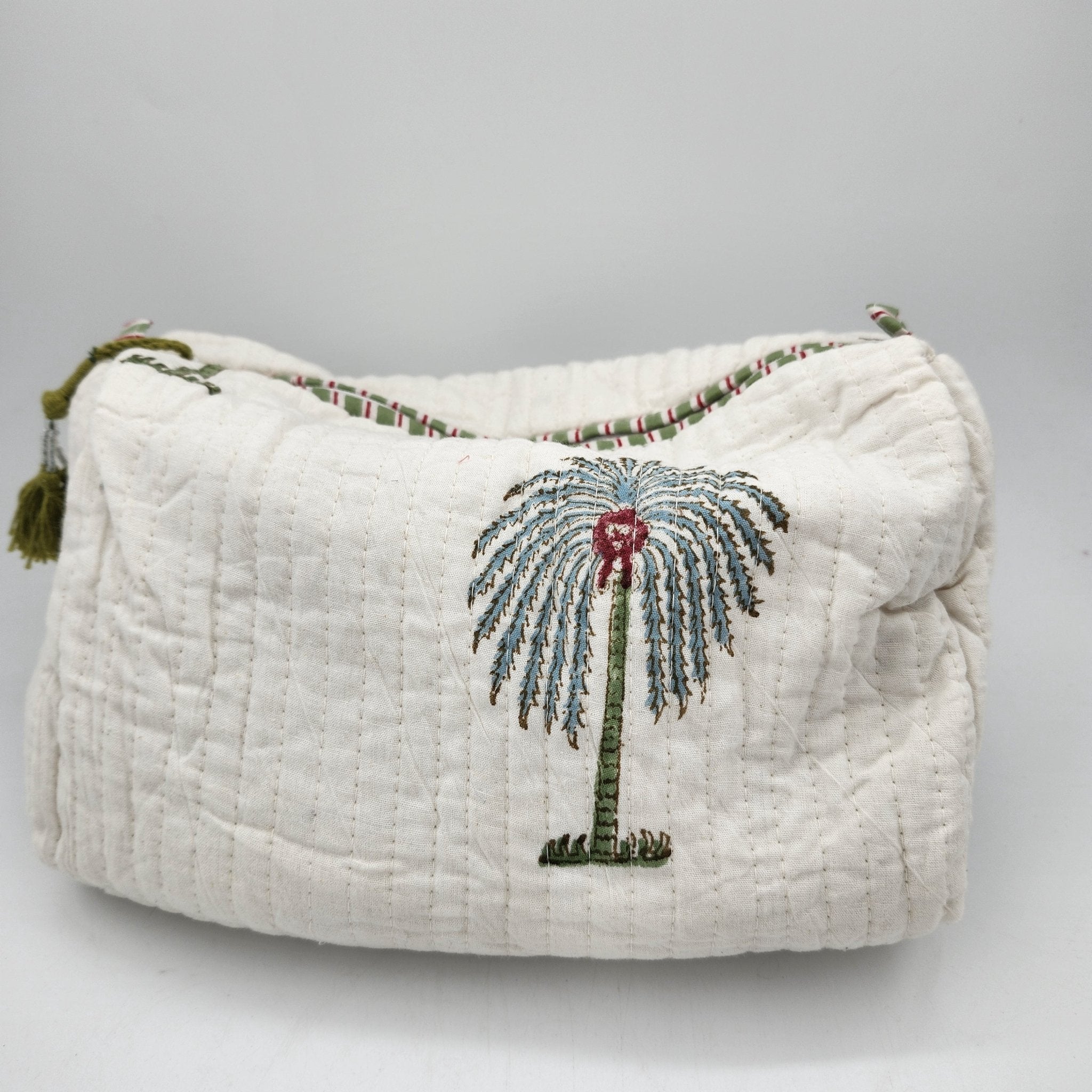 Palm block-print wash bag, blue palms on cream