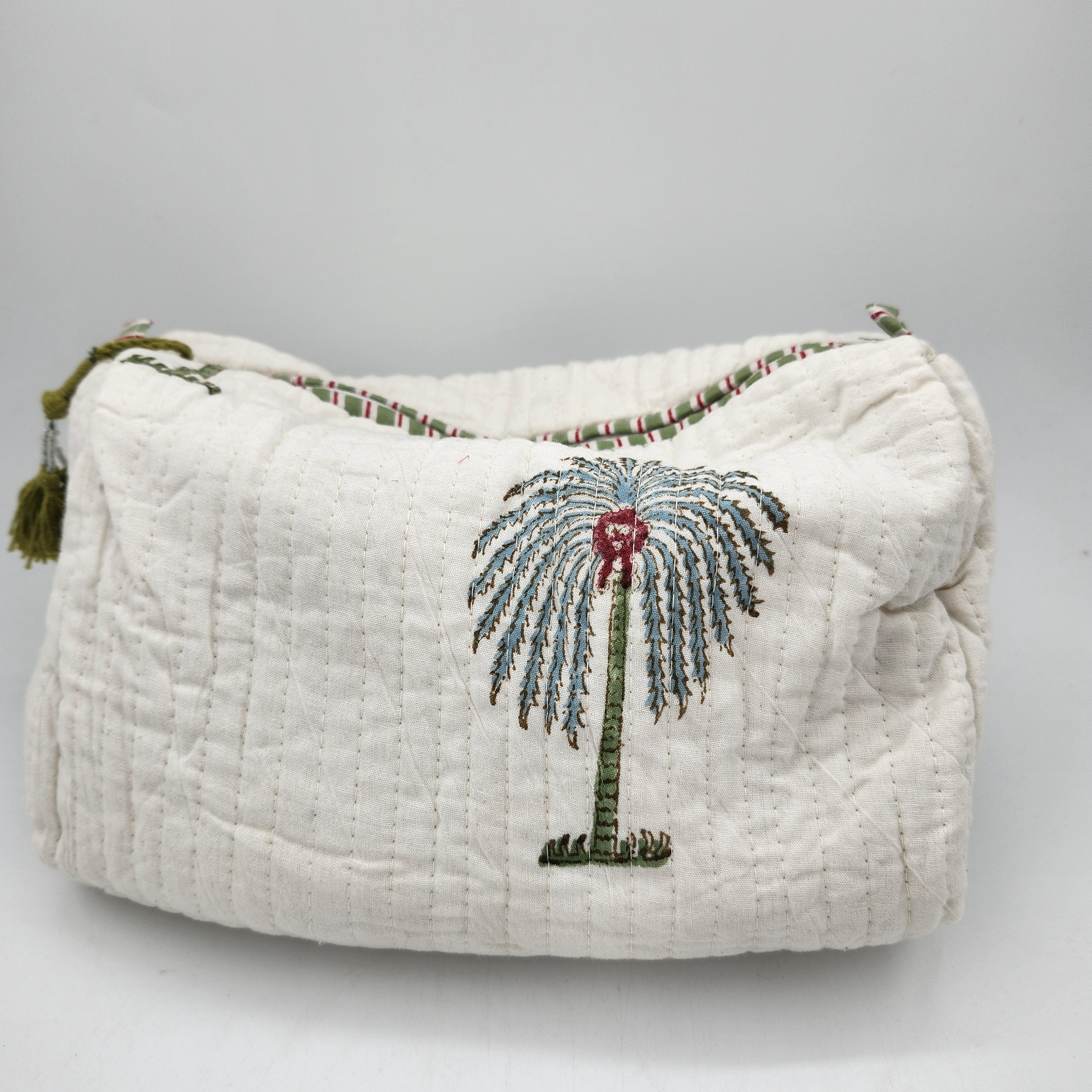 Palm block-print wash bag, blue palms on cream