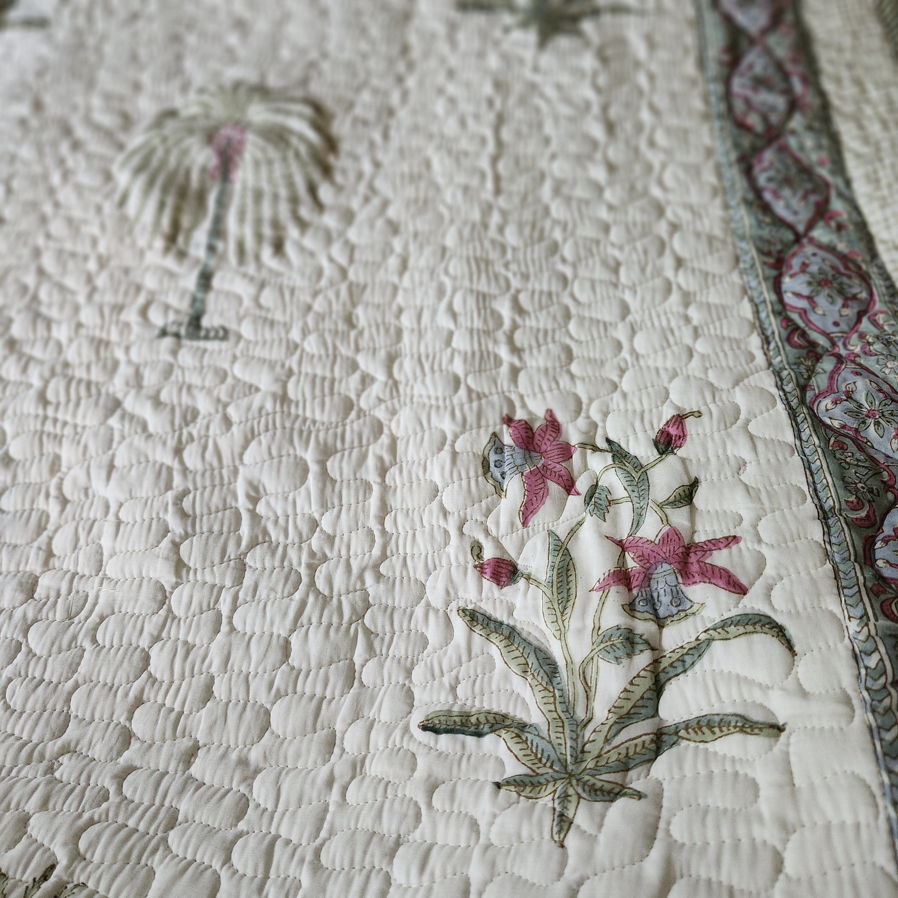 Reversible block-print bedspread with a palm and flower pattern, queen