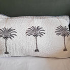 Block-print palm-motif bedspread with a floral border, single