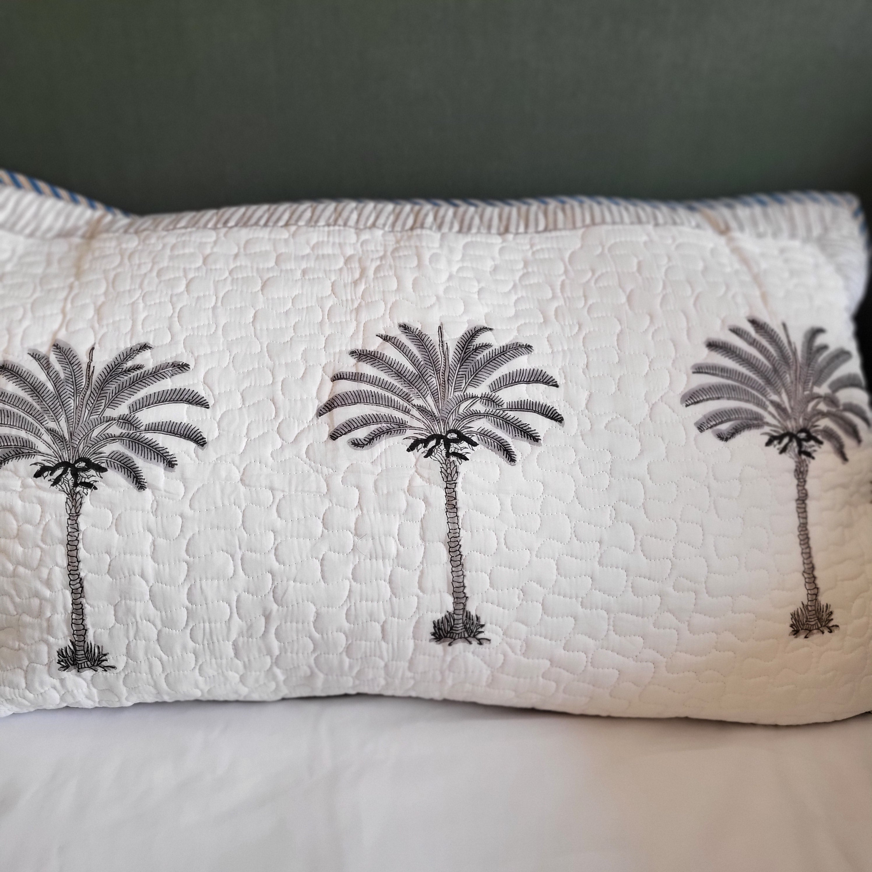 Block-print palm-motif bedspread with a floral border, single