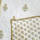 Marigold block-print quilt for children in yellow, detail view