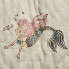 Child's block print quilt with a pretty mermaid on one side, fine organic cotton cambric, about 102 by 152cm, from age three