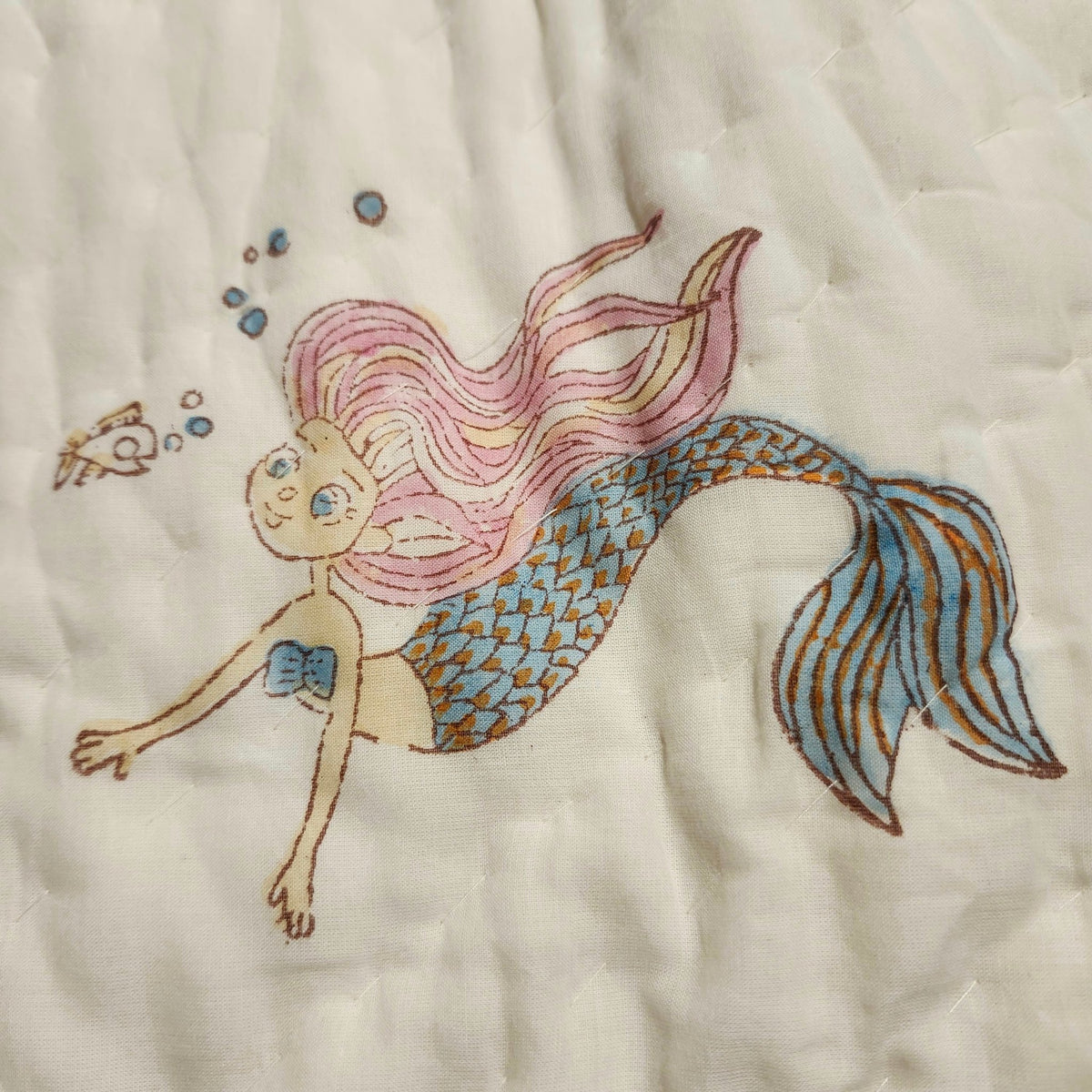 Child's block print quilt with a pretty mermaid on one side, fine organic cotton cambric, about 102 by 152cm, from age three