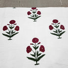 King size poppy bedspread, 260 by 260cm, block printed and quilted entirely by hand in cotton.