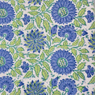 Sunflower block-print cotton bed cover in blue, lime and turquoise