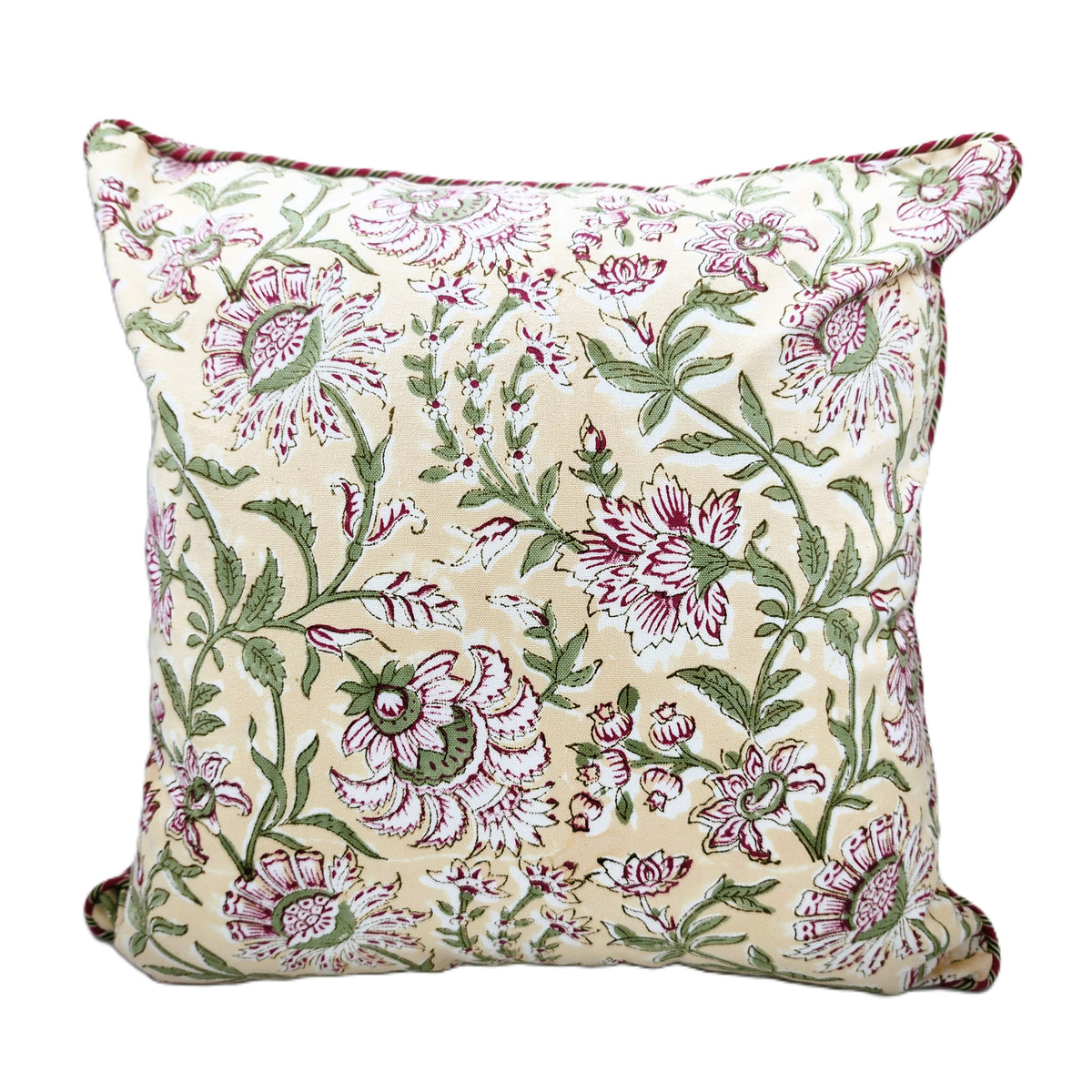 Block print cotton canvas cushion cover with deep pink flowers and green leaves on cream and white, toning striped piping