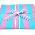 Candy stripe pyjama set with a matching envelope bag