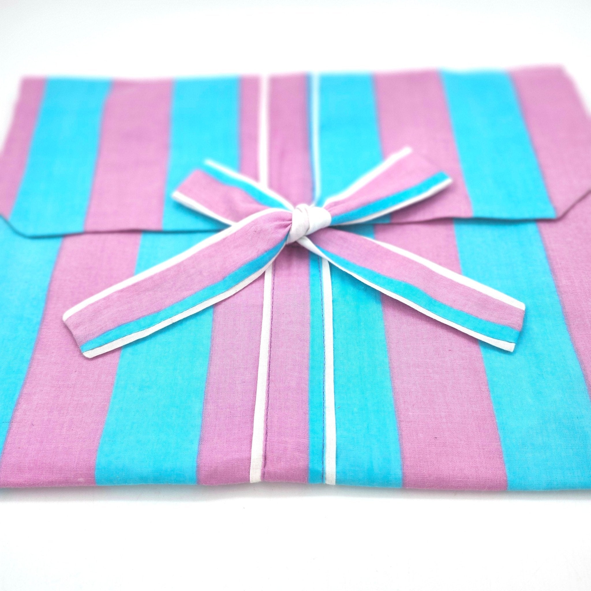 Candy stripe pyjama set with a matching envelope bag