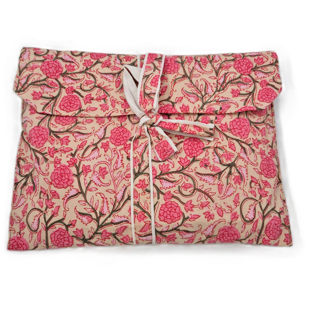 Assorted floral long pyjamas shown with their matching envelope bag, tied with a ribbon for gifting.