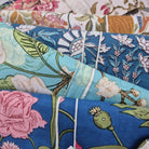 Assorted floral block print long pyjamas in cotton cambric, long-sleeved top with a pocket and contrast trim.
