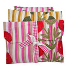 Poppy print pyjamas in soft block printed cotton cambric, long sleeved top with a neat contrast trim.