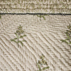 King block-print quilt with yellow flowers on cream