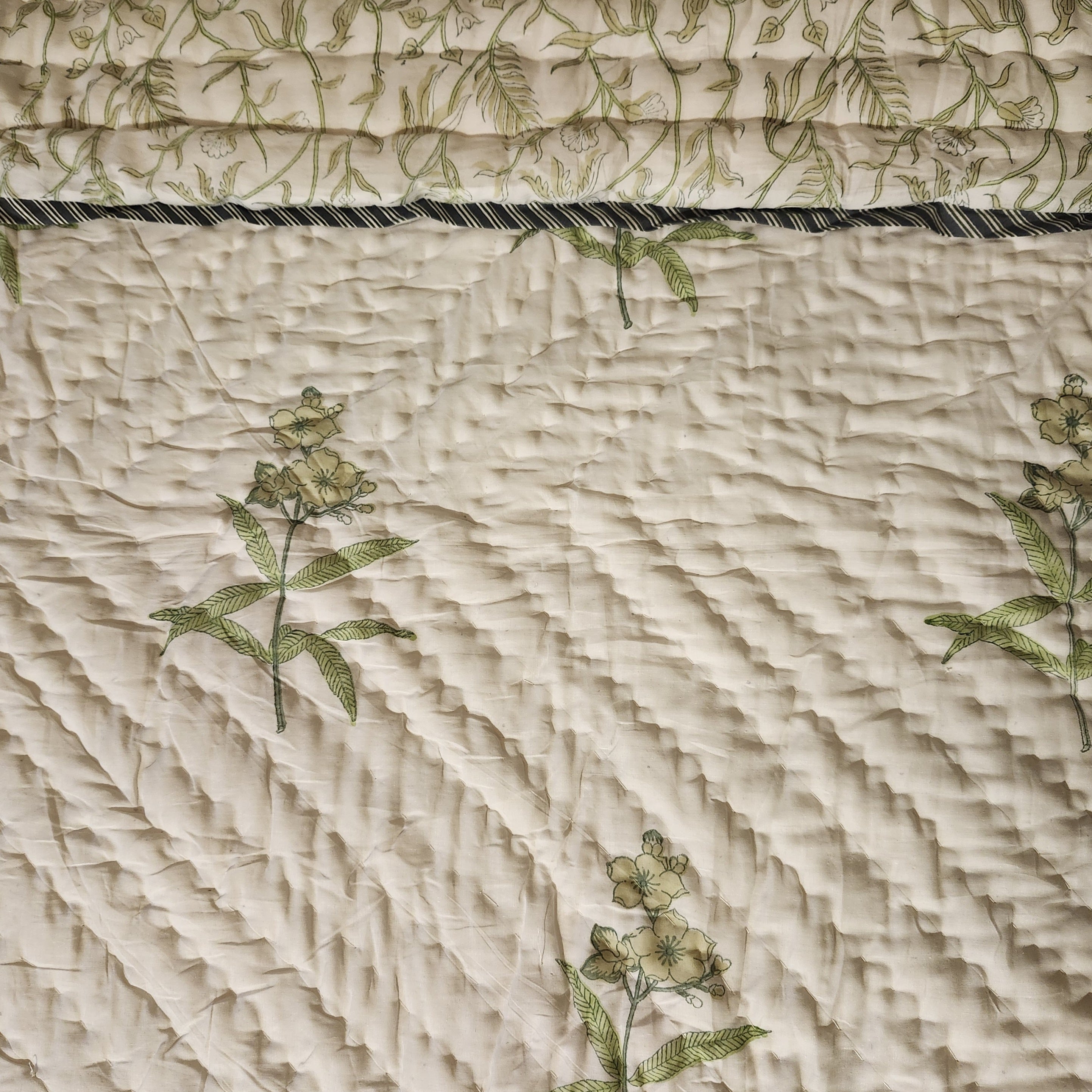 King block-print quilt with yellow flowers on cream