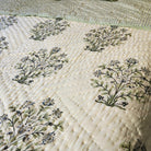 Block-print quilt, blue flowers side