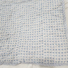 Block-print single quilt, blue and pale pink floral reverse