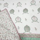 Peacock-motif block-print quilt in cotton, lightweight and reversible, detail
