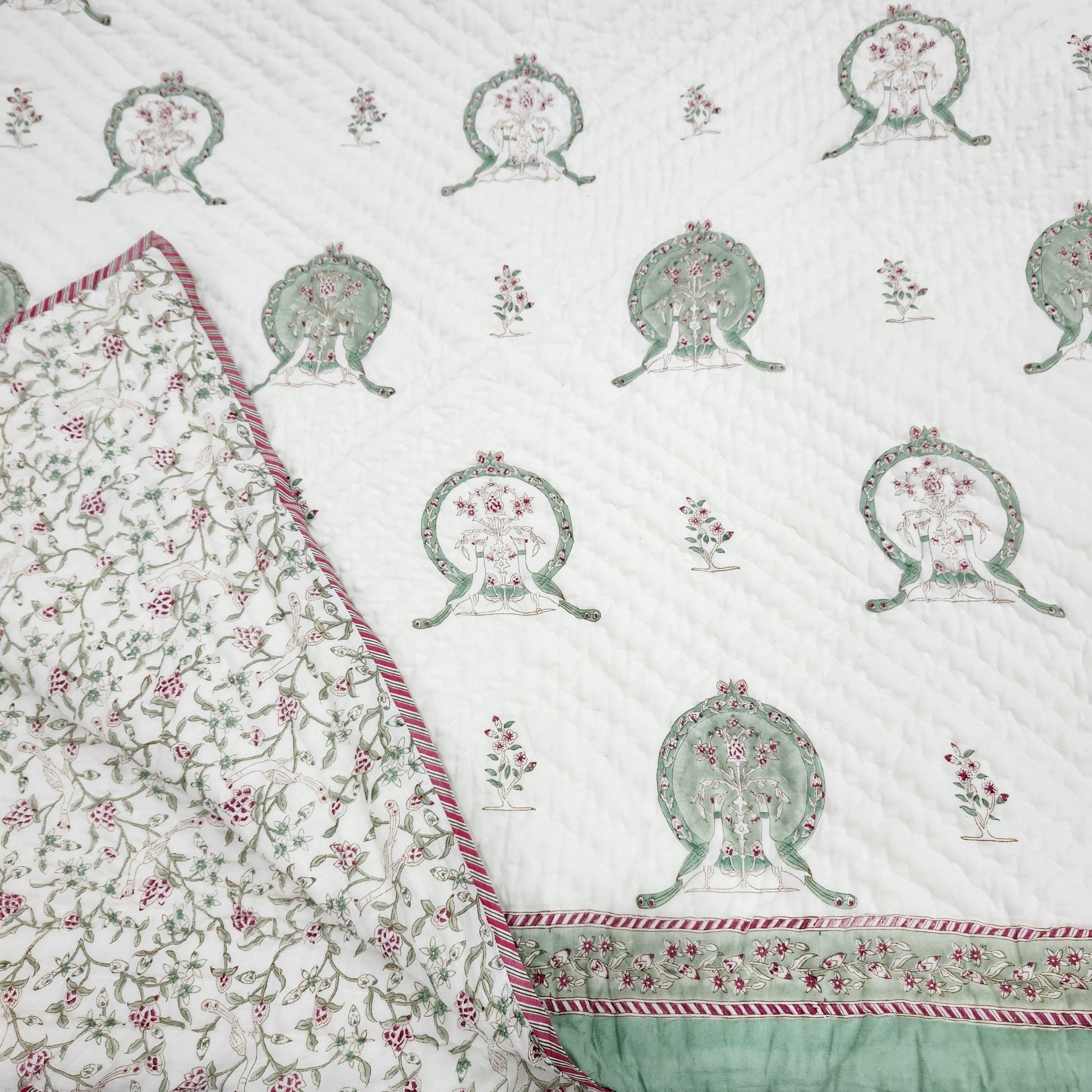 Peacock-motif block-print quilt in cotton, lightweight and reversible, detail