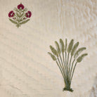 Reversible traveller's palm block-print quilt