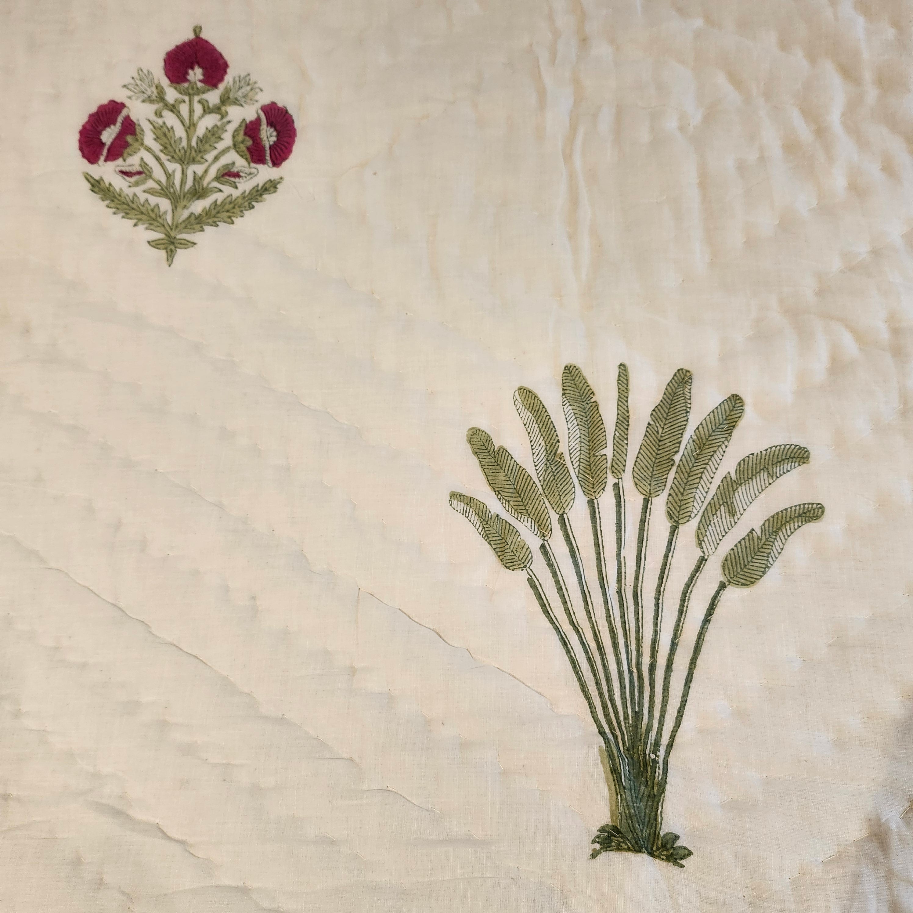 Reversible traveller's palm block-print quilt