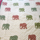 Single block-print quilt with elephants and flowers
