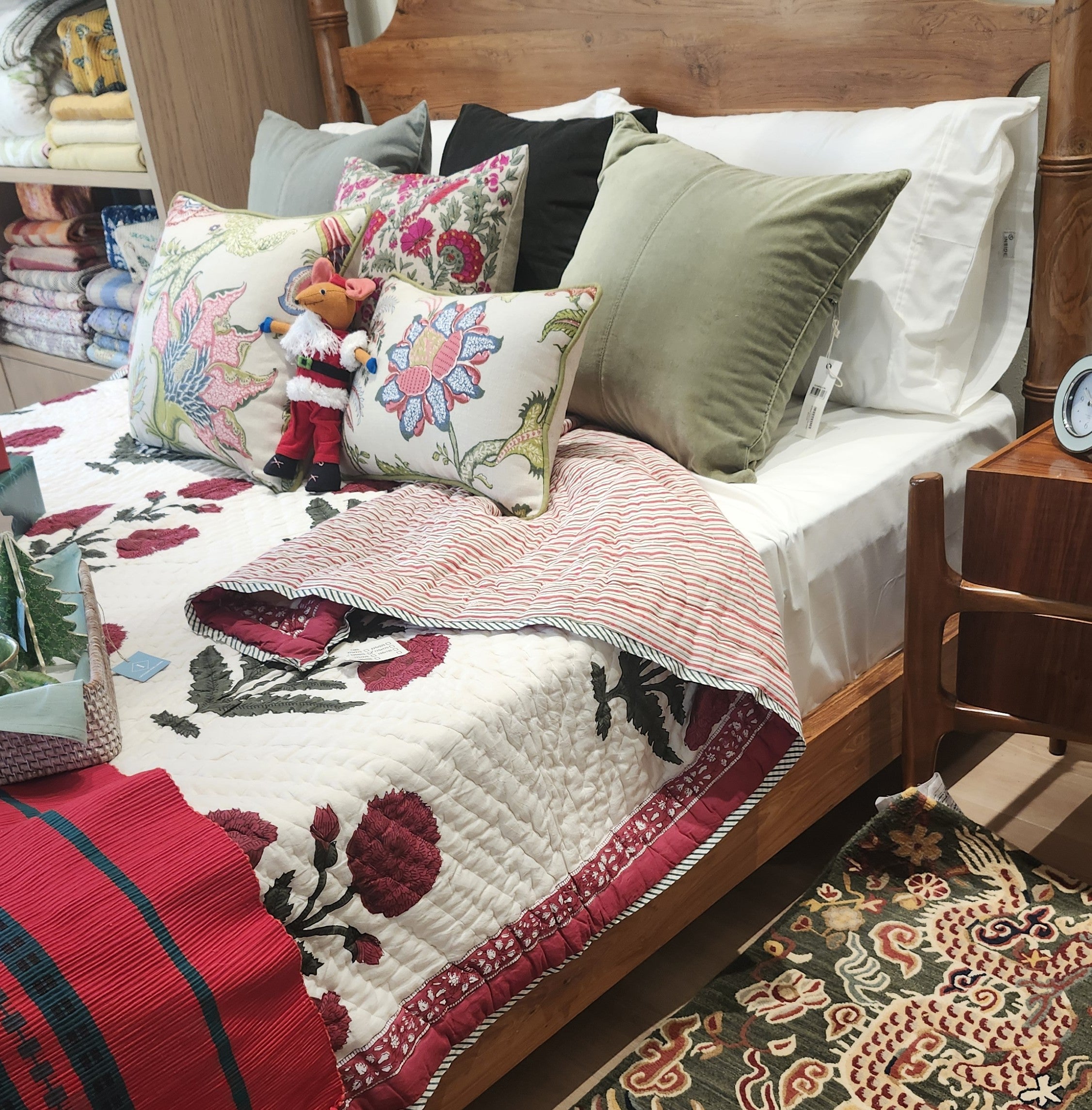 Red poppy block-print quilt with a striped border