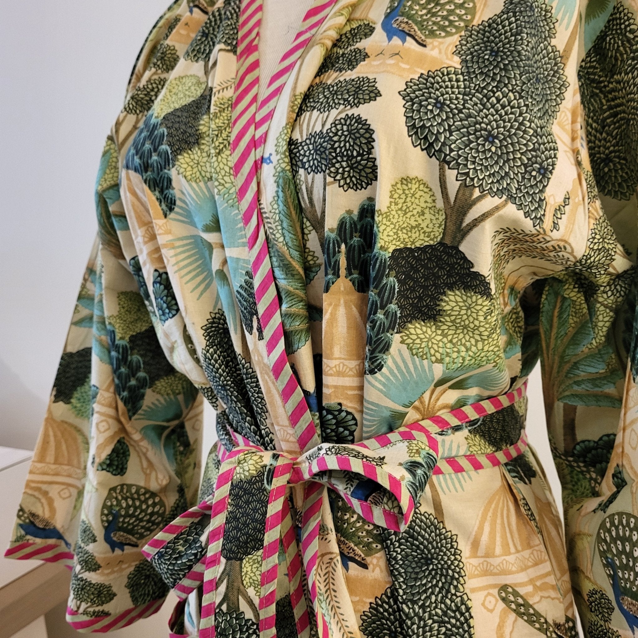 Paradise block print cotton robe, peacocks on green with pink trim, one size
