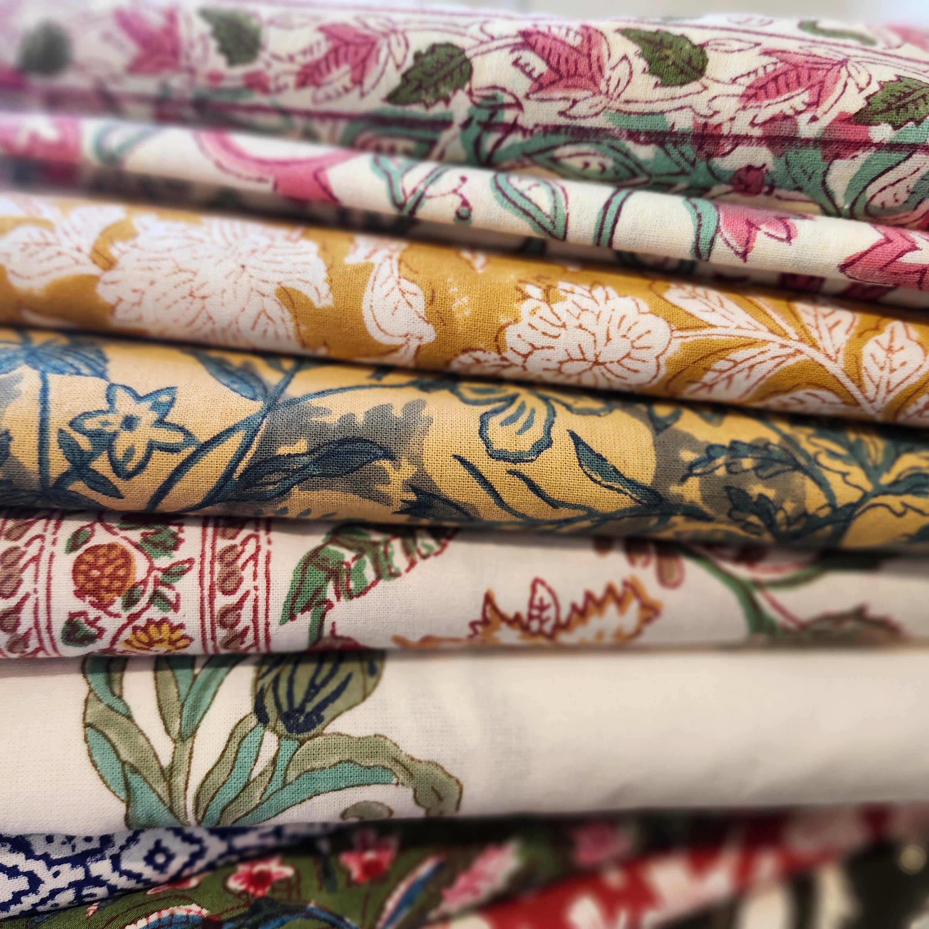 Collection of 225 x 150cm block print table cloths in various colours and designs.
