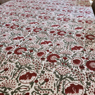 Carnation print cotton tablecloth in red and green