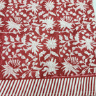 Festive Red floral block print, cotton napkin detail showing the all-over pattern