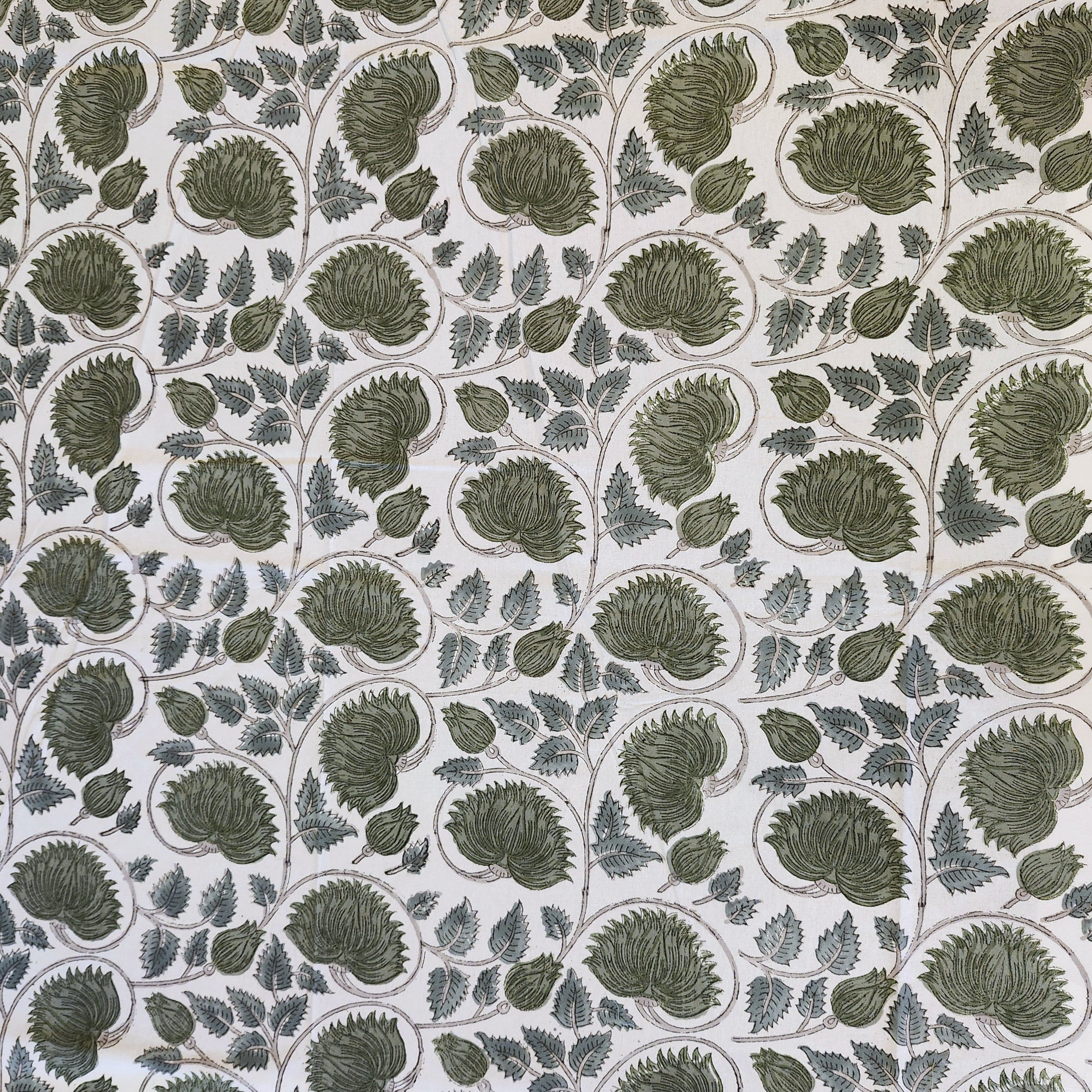 Lotus Patterned tablecloth with green leaves on a white background