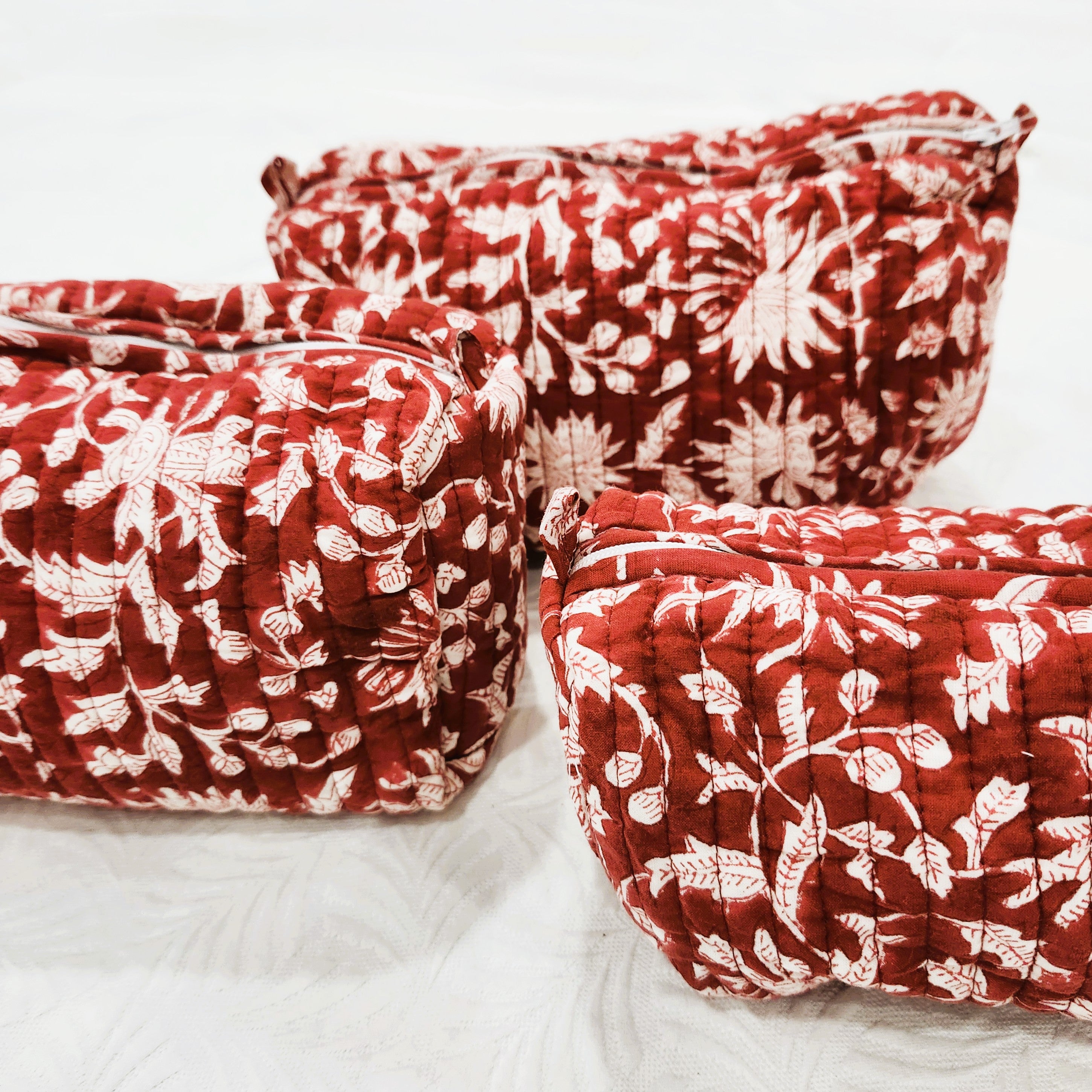 Festive red block-print cotton wash bag