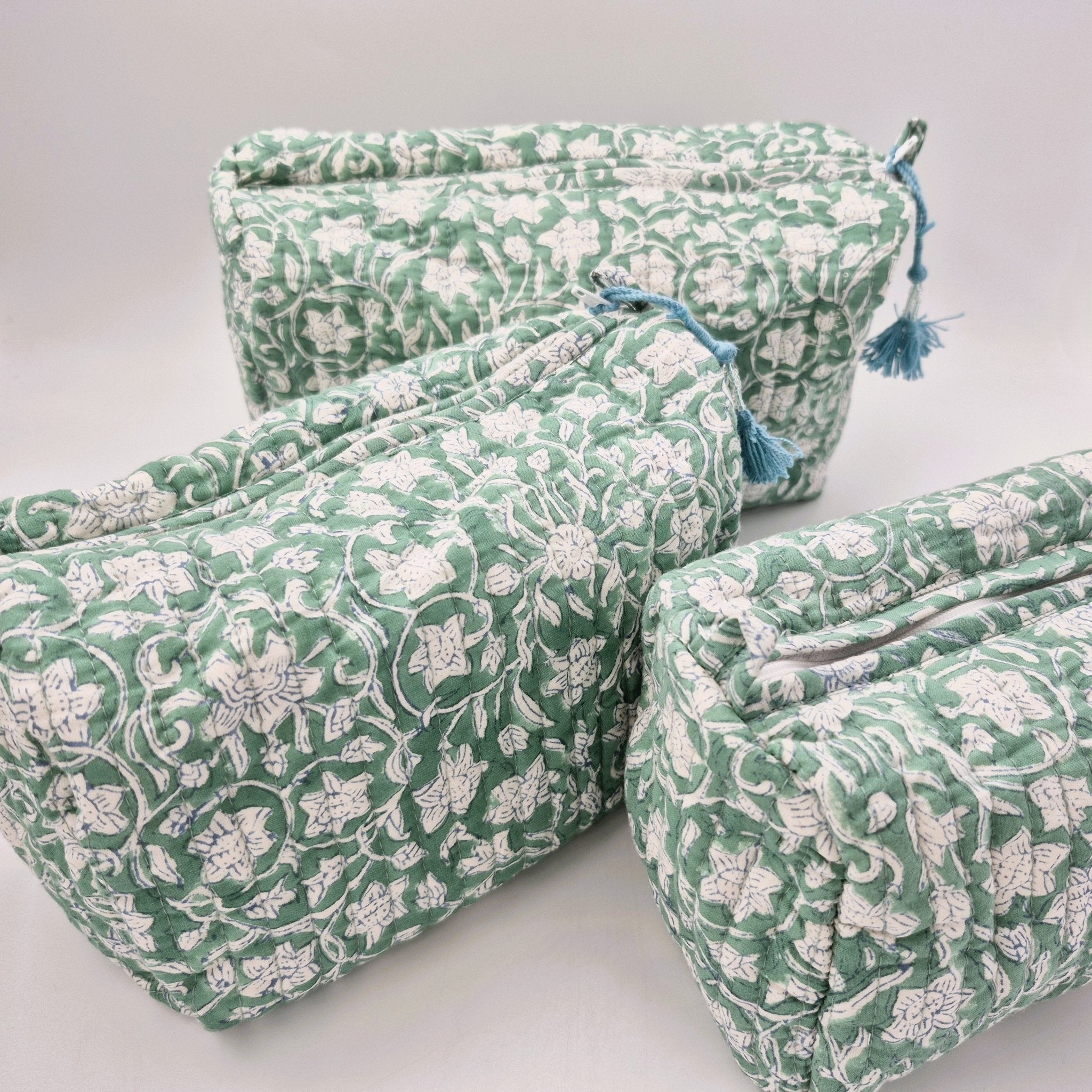 Floral green block-print wash bag with a tassel zip