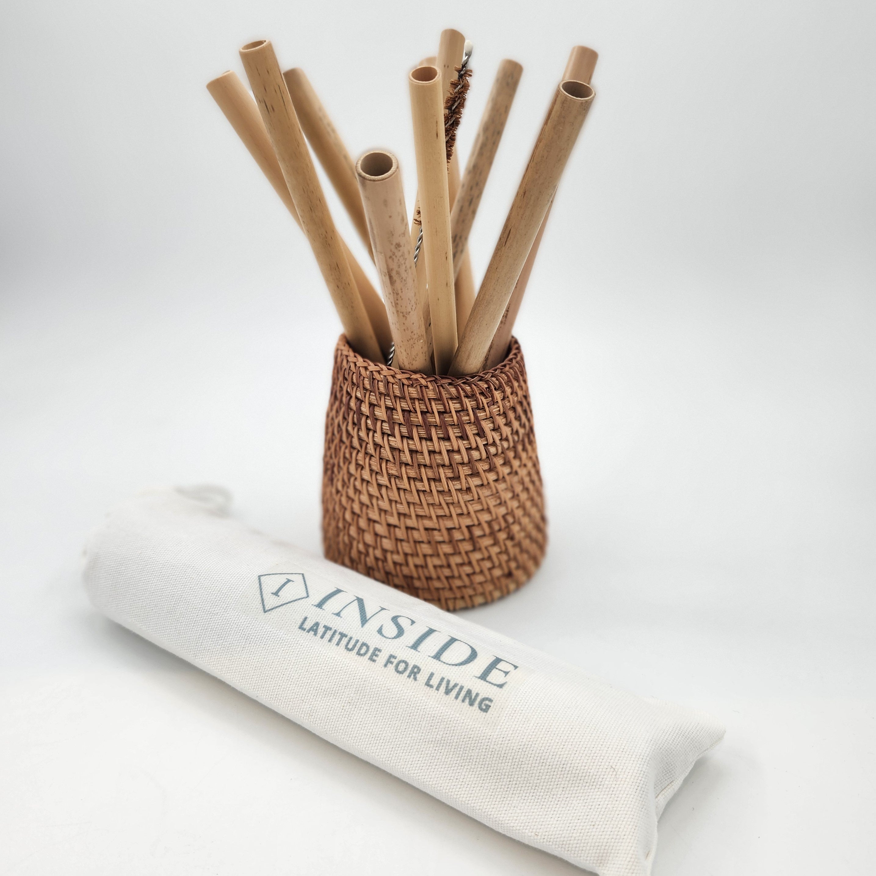 Pack of 10 reusable bamboo drinking straws with cleaning brush