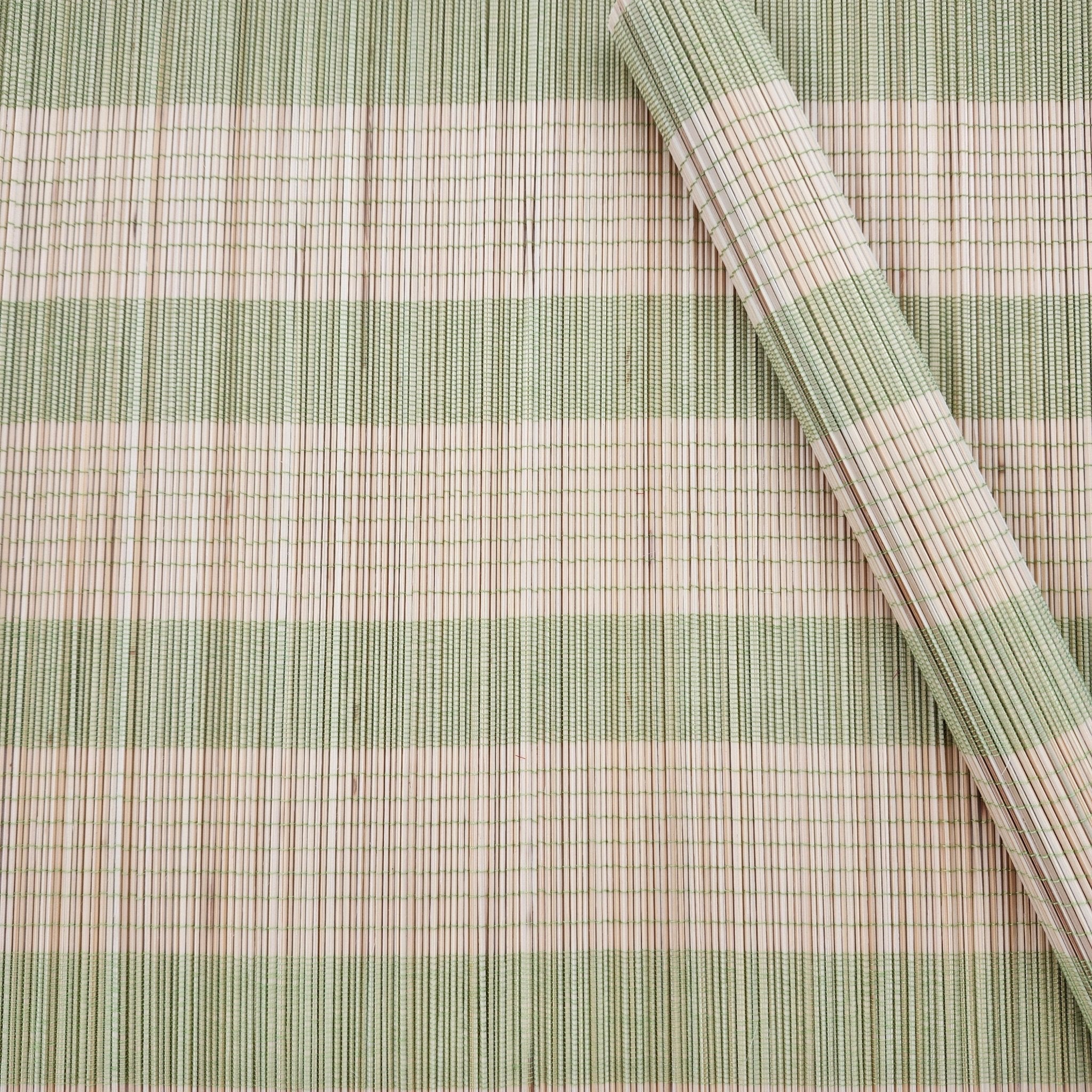 A Bamboo placemat with lime green stripes
