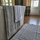 Woven cotton bath mats with looped weave design, group view, 100% cotton