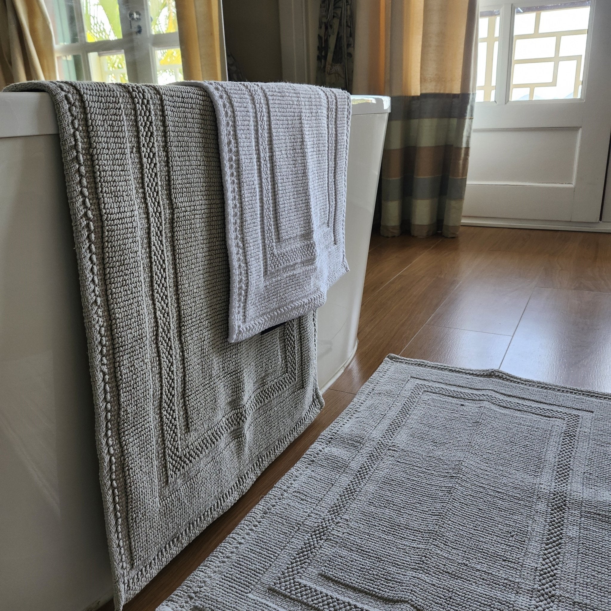Woven cotton bath mats with looped weave design, group view, 100% cotton