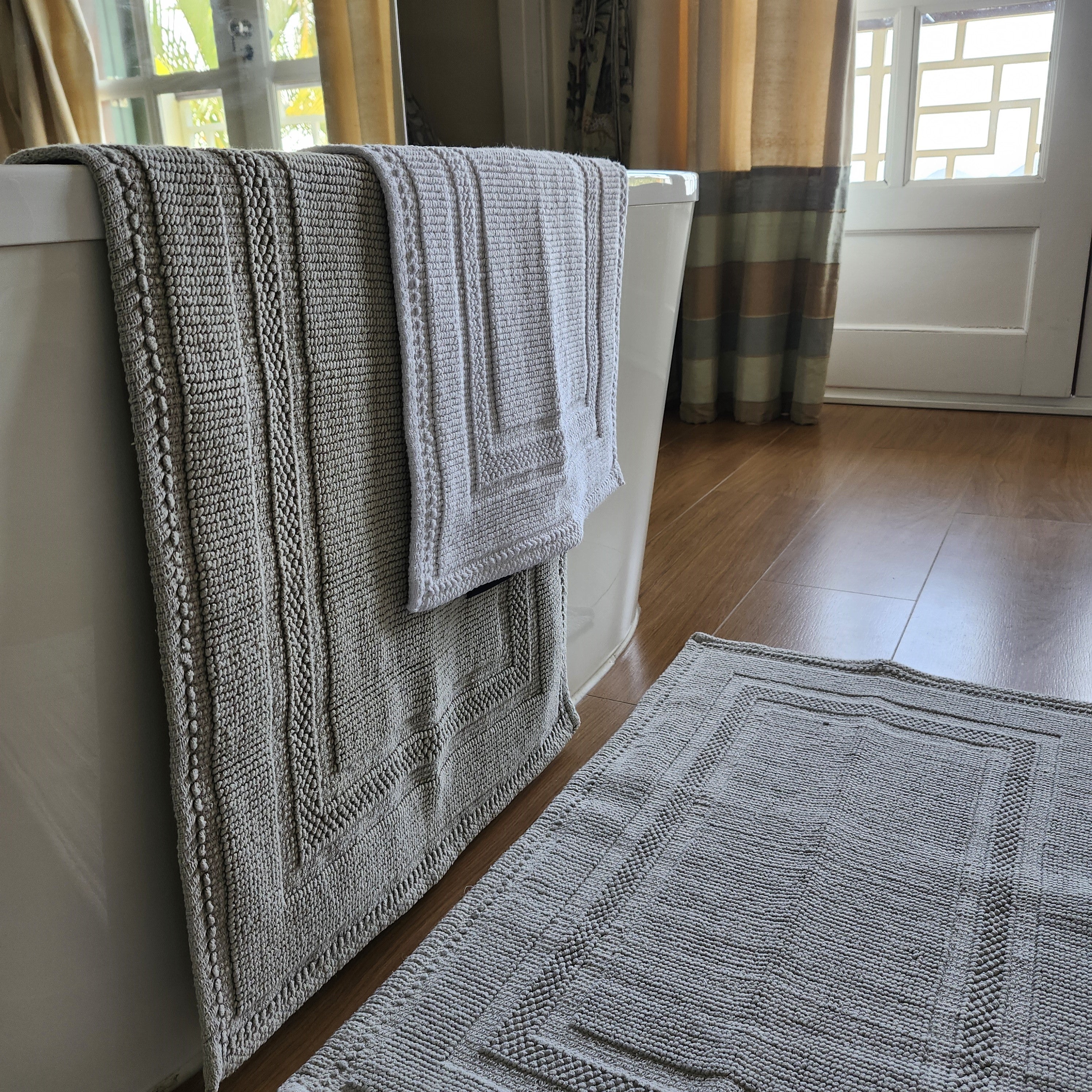 Woven cotton bath mats with looped weave design, group view, 100% cotton