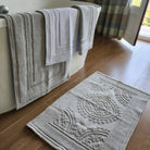 Woven cotton bath mats in four colourways, looped weave, 100% cotton