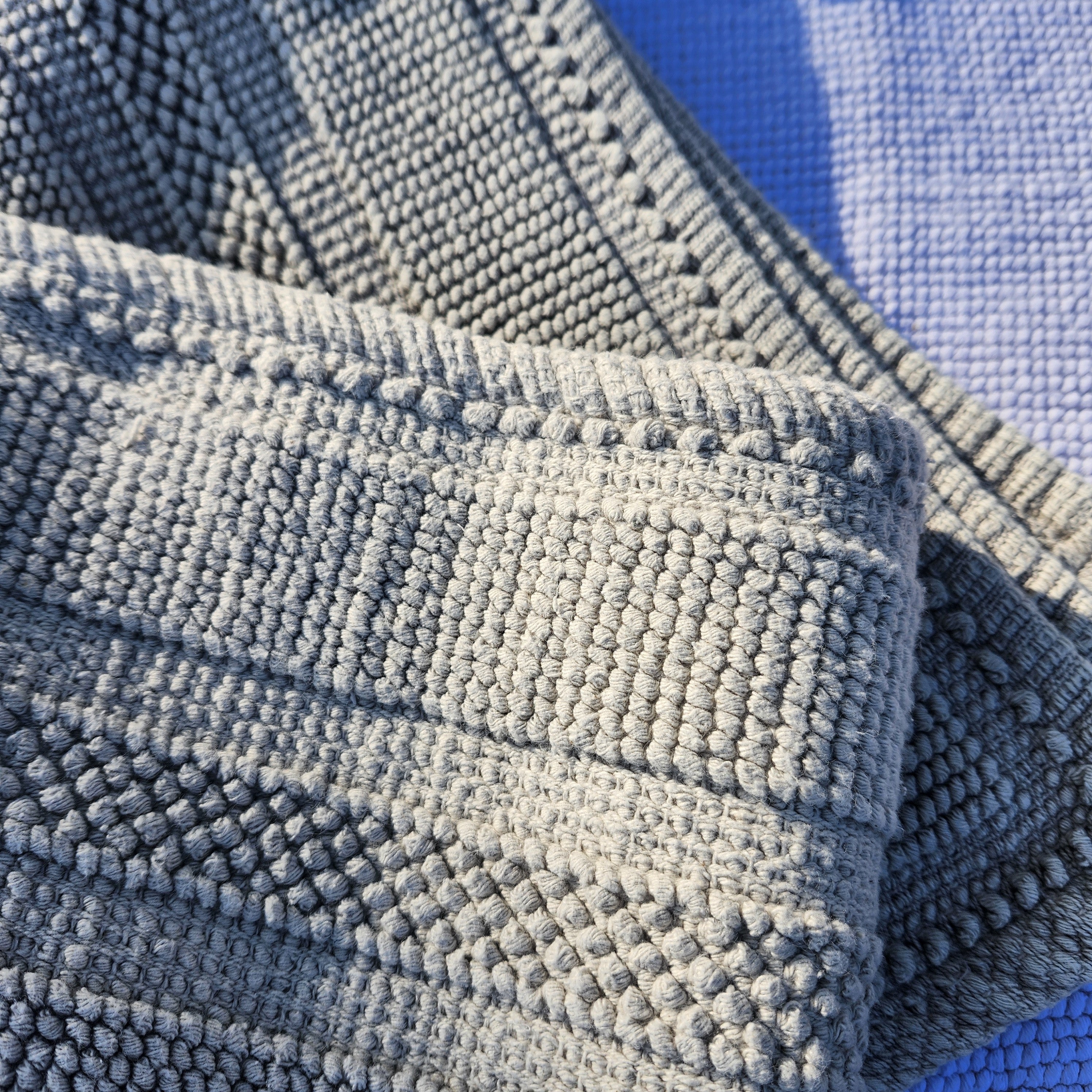 Woven cotton bath mats in taupe and light grey, looped weave, 100% cotton