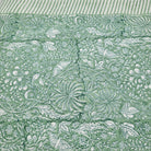 Teal rainforest block-print cotton tablecloth with a striped border