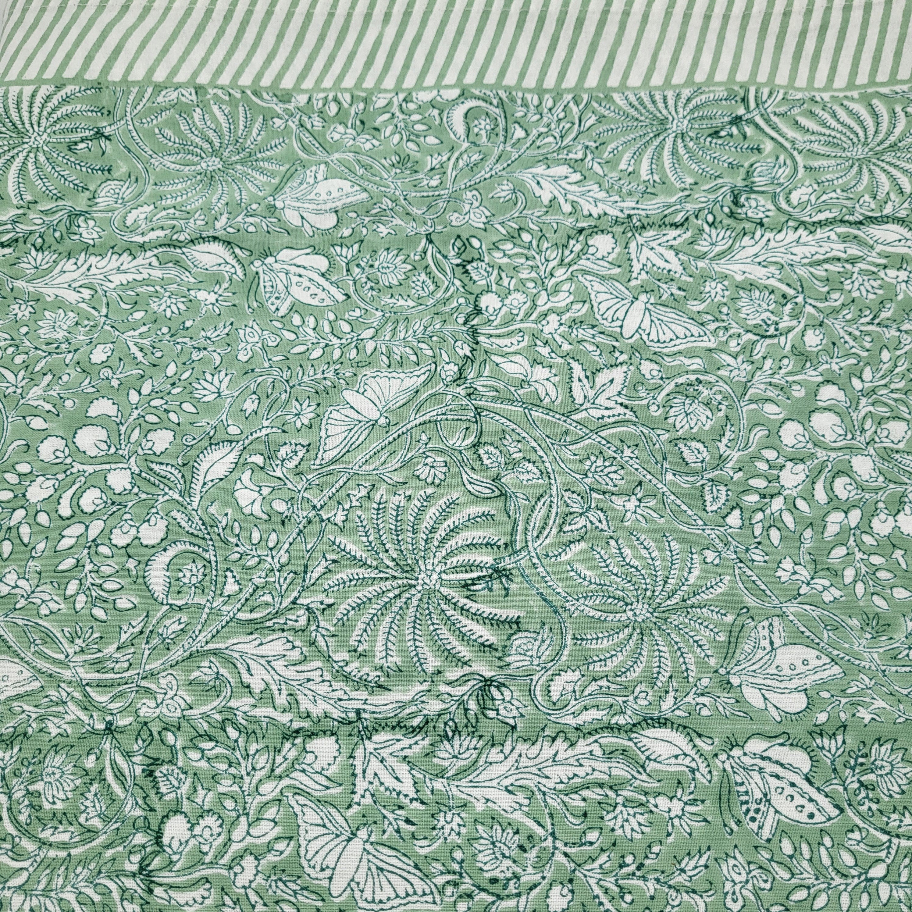 Teal rainforest block-print cotton tablecloth with a striped border