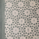 Bluey-green star block-print cotton tablecloth with floral and geometric motifs
