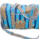 Quilted block-print weekend bag in a blue tiger print