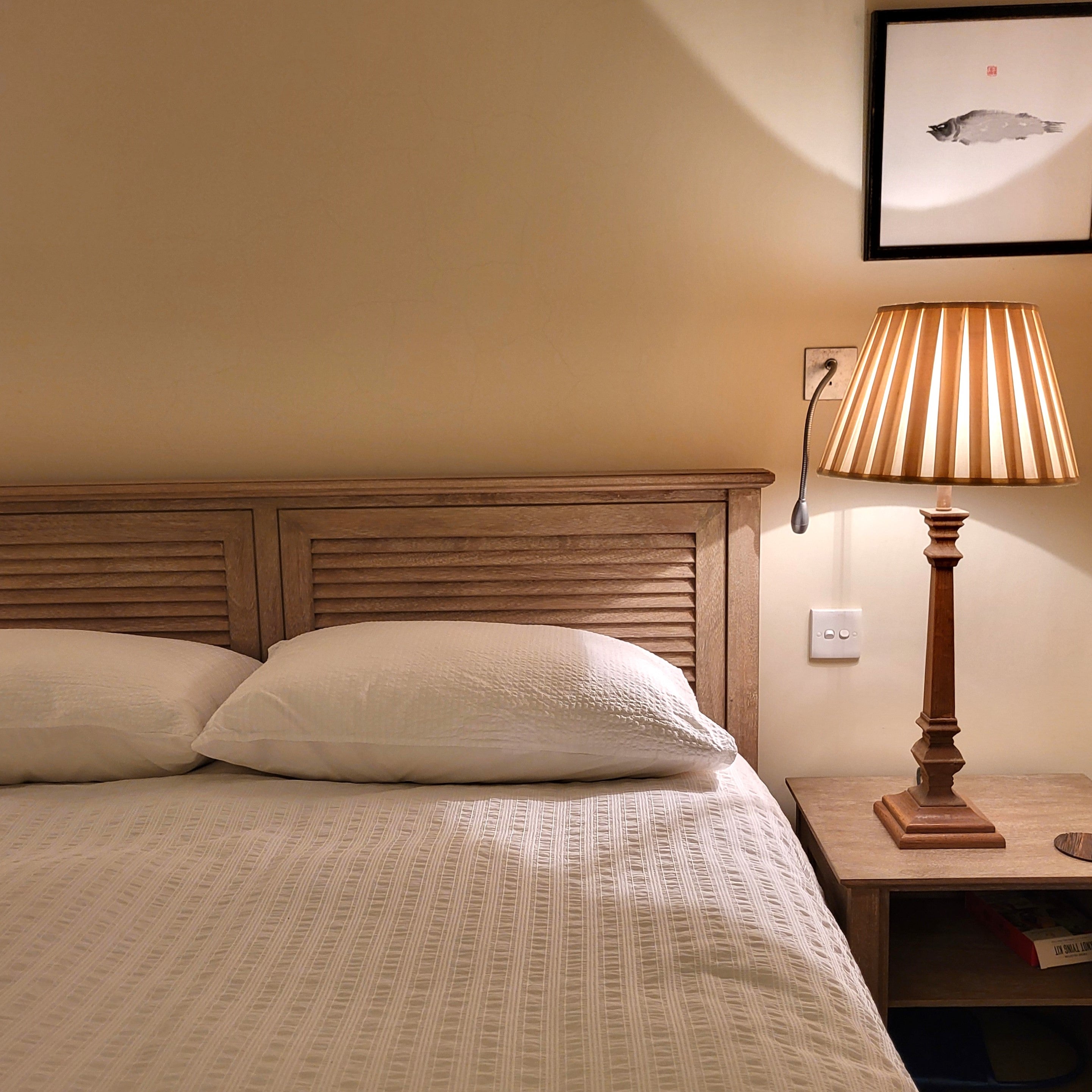 Bosham double bed in mango wood with an antique linen finish