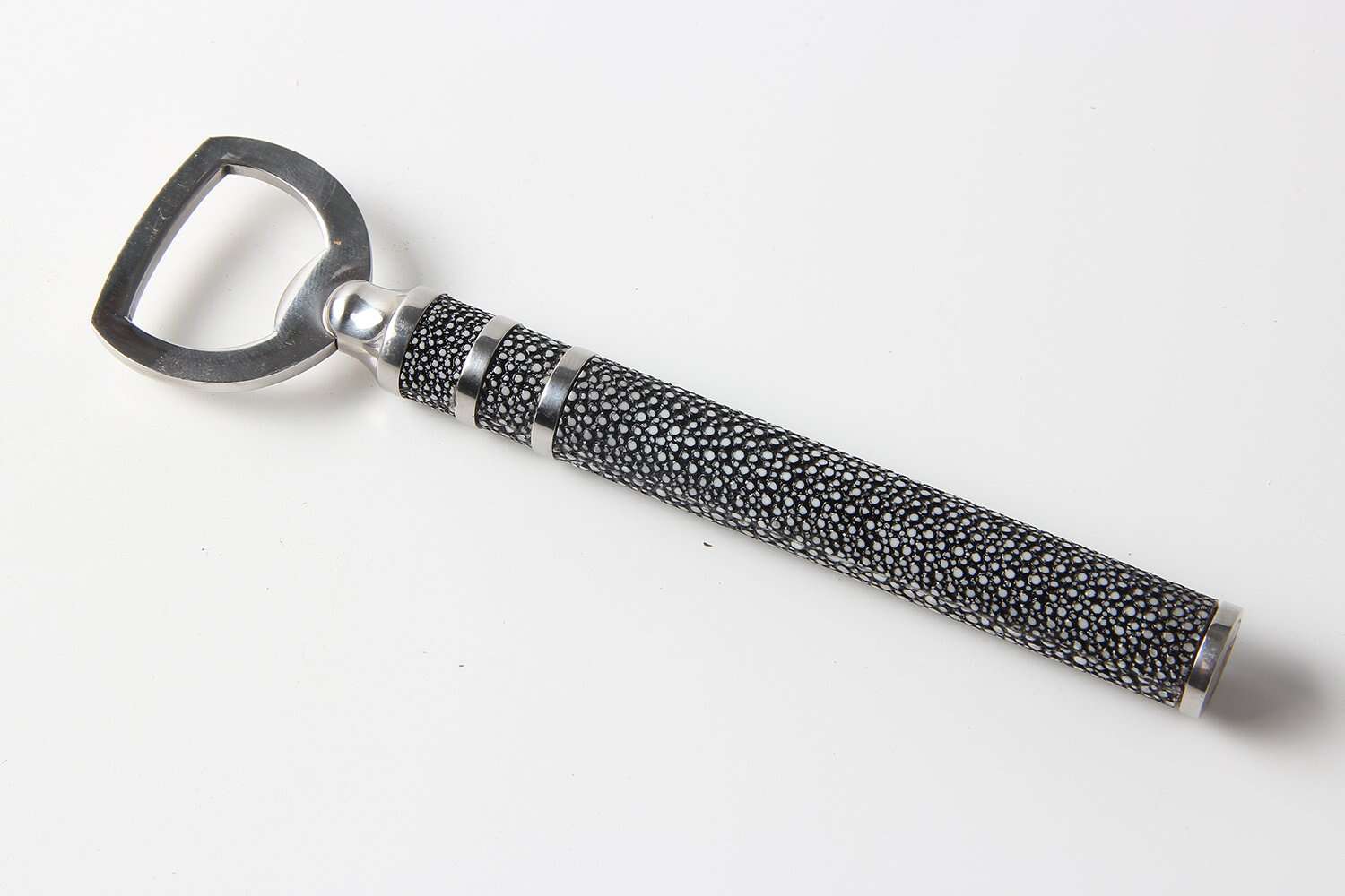 Charcoal faux shagreen bottle opener by Forwood Design, stainless steel, styled with bottles