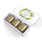 Christmas candle gift set in festive box, three brass-holder soy candles