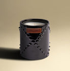 Nomad Atlas Cedar candle in black-glazed handmade ceramic jar, cedar wood scent