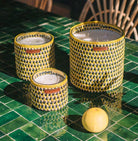 Raphia Talia Night Jasmine candle in natural, charcoal and yellow raffia, jasmine and ylang scent